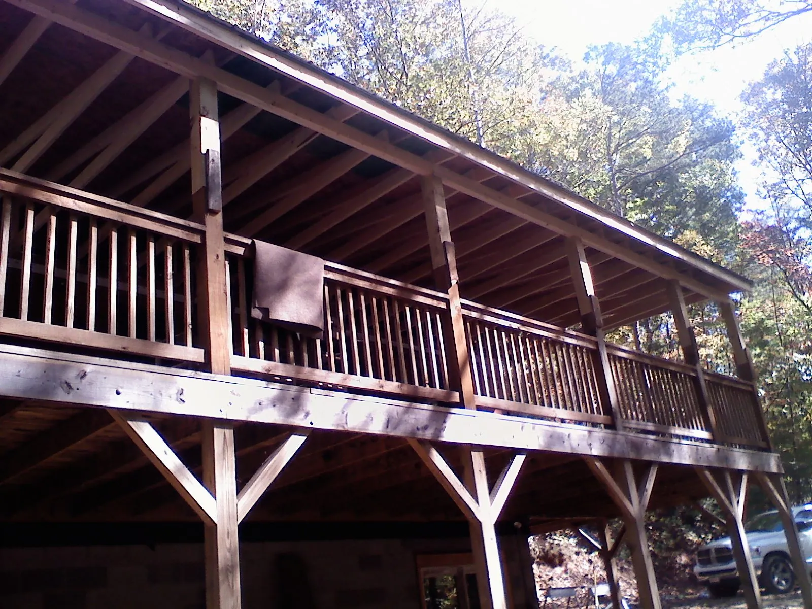 Timber framing under a new elevated porch and deck — Roof Leak Repair in Belding by Roofing Brothers